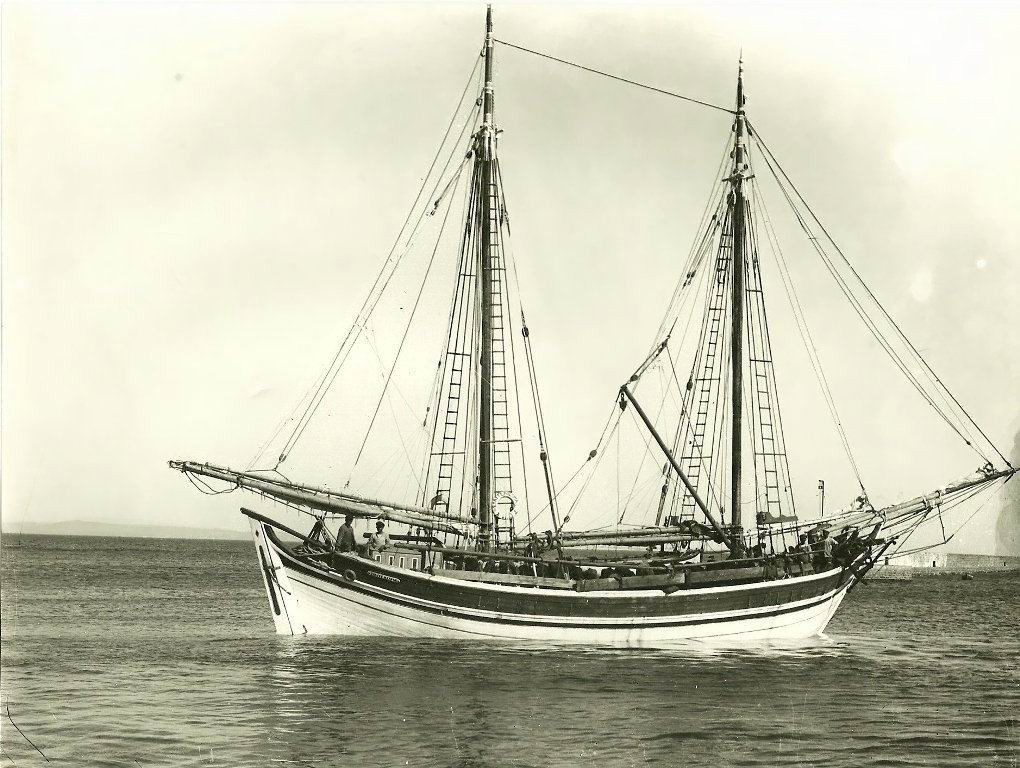 A traditional bratsera — the two-masted Aegean schooner the brand is named after