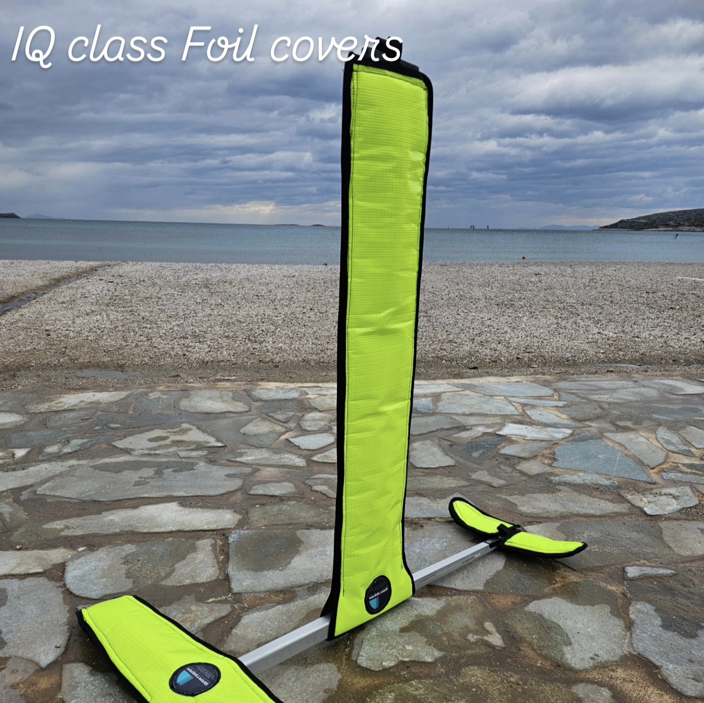 IQ Class foil covers - mast cover on beach